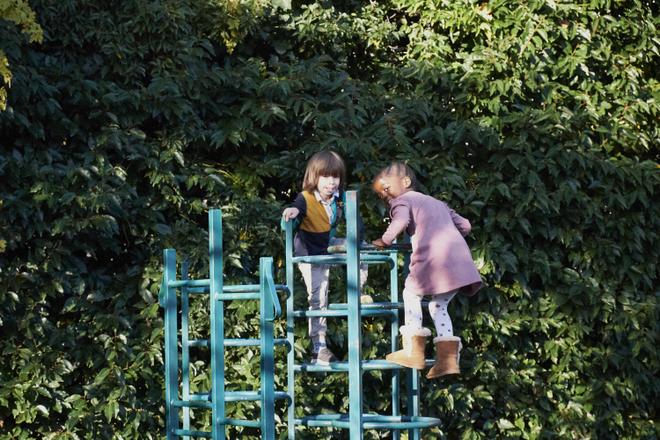 Nursery children on a climbing frame