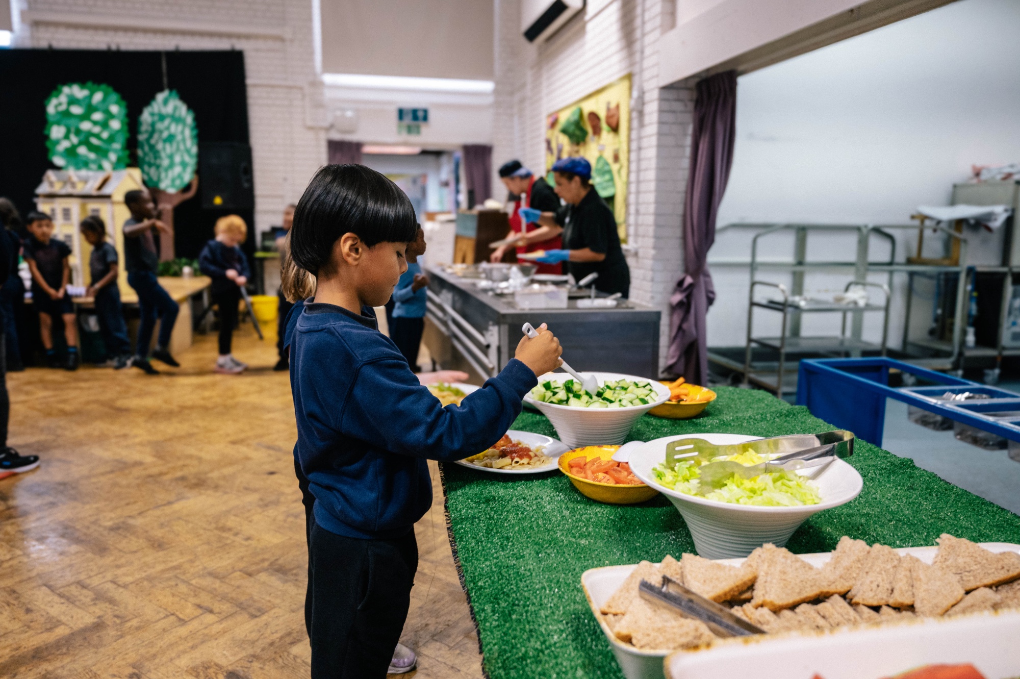 Pupil having a school lunch